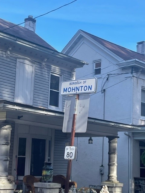 A signboard of Borough of Mohnton near the building